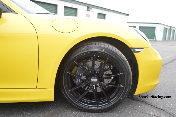 Racing Yellow Porsche Cayman 981 with O.Z. Leggera Wheels