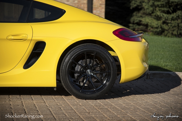 Racing Yellow Porsche Cayman 981 with O.Z. Leggera Wheels